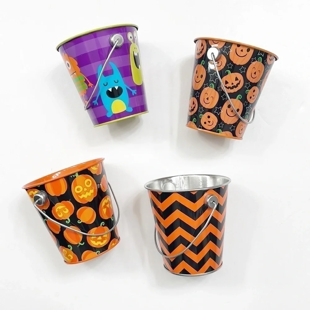 Set of 4 small Halloween/monster print metal pails - 4 inch